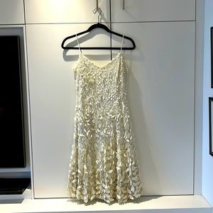 Size 4 off white gorgeous slinky dress for special occasions.